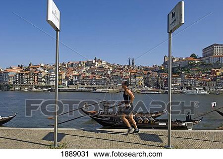 A Man Jogging Along The Quayside At Oporto View Large Photo Image Stock Image - A Man Jogging Along The Quayside At Oporto. Fotosearch