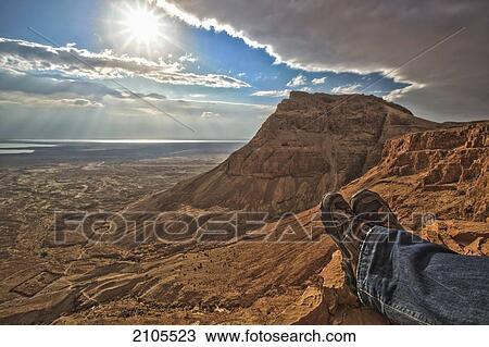 A Man Sits Looking Out Over The Dead Sea At Masada; Isreal View Large Photo Image Stock Image - A Man Sits Looking Out Over The Dead Sea At Masada; Isreal. Fotosearch