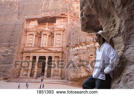 A Man Standing Near Al Khazneh In Petra View Large Photo Image Stock Image - A Man Standing Near Al Khazneh In Petra. Fotosearch