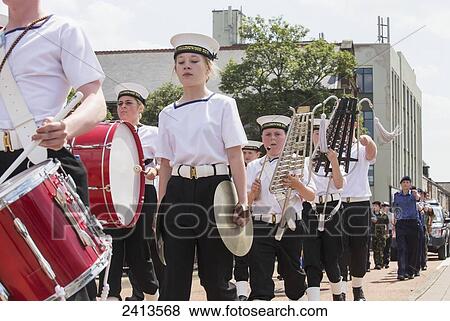 Stock Photo - A marching band walking down the street; South Shields, Tyne and Wear, England. Fotosearch