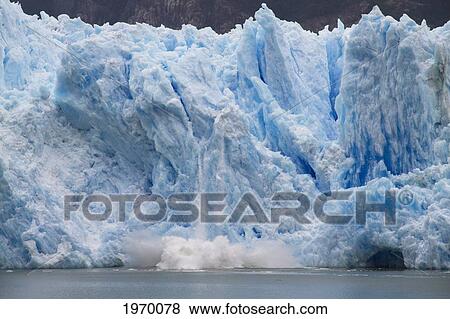 Stock Photo - A Mass Of Ice Calves From The San Rafael Glacier Into Laguna San Rafael, Laguna San Rafael National Park, Aysen Region, Chile. Fotosearch