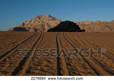 Picture - A maze of monolithic rockscapes rising up from the desert floor, Wadi Rum; Jordan. Fotosearch