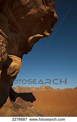 A maze of monolithic rockscapes rising up from the desert floor, Wadi Rum; Jordan View Large Photo Image Stock Photo - A maze of monolithic rockscapes rising up from the desert floor, Wadi Rum; Jordan. Fotosearch