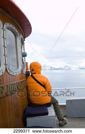 Stock Image - A Midnight Cruise Around The Ilulissat Ice Fjord, One Of Unesco World Heritage Sites. Greenland.. Fotosearch
