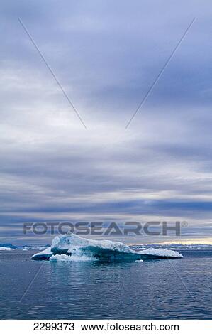 Stock Image - A Midnight Cruise Around The Ilulissat Ice Fjord, One Of Unesco World Heritage Sites. Greenland.. Fotosearch