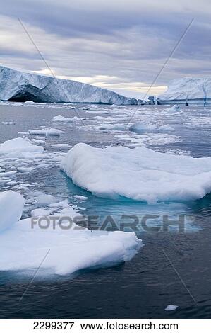Stock Photo - A Midnight Cruise Around The Ilulissat Ice Fjord, One Of Unesco World Heritage Sites. Greenland.. Fotosearch