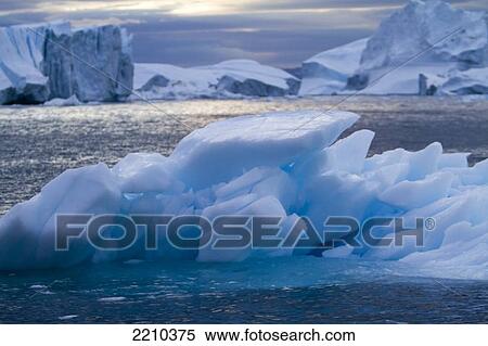 Stock Photography - A Midnight Cruise Around The Ilulissat Ice Fjord, One Of Unesco World Heritage Sites. Greenland.. Fotosearch
