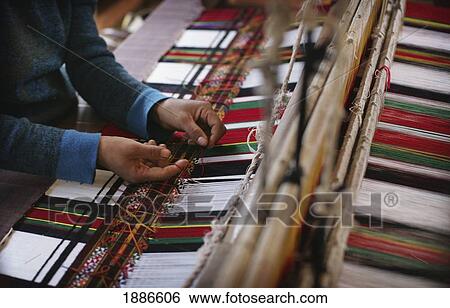 A Mizo Woman Operating A Mechanical Handloom Producing Traditional Mizo Fabric View Large Photo Image Stock Photograph - A Mizo Woman Operating A Mechanical Handloom Producing Traditional Mizo Fabric. Fotosearch