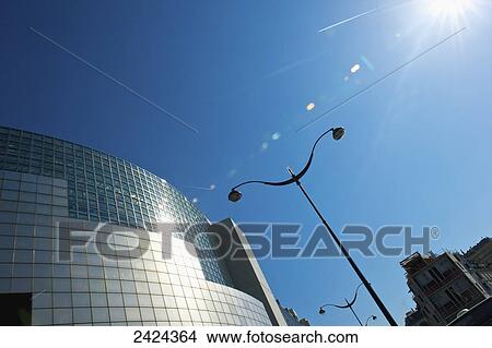 A modern building with blue sky and sunlight; Paris, France View Large Photo Image Picture - A modern building with blue sky and sunlight; Paris, France. Fotosearch