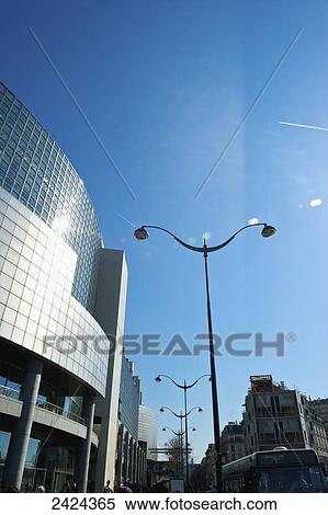 A modern building with blue sky and sunlight; Paris, France View Large Photo Image Stock Photography - A modern building with blue sky and sunlight; Paris, France. Fotosearch