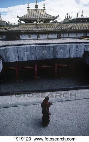 A Monk At Jokhang Temple Entrance; Barkhor Square, Lhasa, Tibet View Large Photo Image Stock Image - A Monk At Jokhang Temple Entrance; Barkhor Square, Lhasa, Tibet. Fotosearch