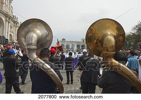 A Music Band Plays Funeral Marches During The Procession Of The Holy Cross On Good Friday In Antigua Guatemala, Sacatep View Large Photo Image Stock Image - A Music Band Plays Funeral Marches During The Procession Of The Holy Cross On Good Friday In Antigua Guatemala, Sacatep. Fotosearch