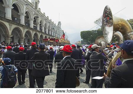 A Music Band Plays Funeral Marches During The Procession Of The Holy Cross On Good Friday In Antigua Guatemala, Sacatep View Large Photo Image Stock Image - A Music Band Plays Funeral Marches During The Procession Of The Holy Cross On Good Friday In Antigua Guatemala, Sacatep. Fotosearch