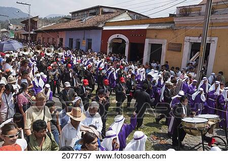 Stock Photo - A Music Band Plays Funeral Marches During The Procession Of The Holy Cross On Good Friday In Antigua Guatemala, Sacatep. Fotosearch