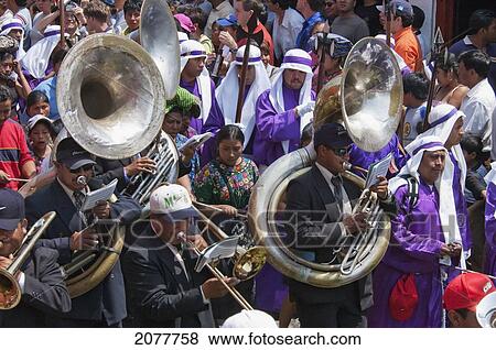 A Music Band Plays Funeral Marches During The Procession Of The Holy Cross On Good Friday In Antigua Guatemala, Sacatep View Large Photo Image Stock Photo - A Music Band Plays Funeral Marches During The Procession Of The Holy Cross On Good Friday In Antigua Guatemala, Sacatep. Fotosearch