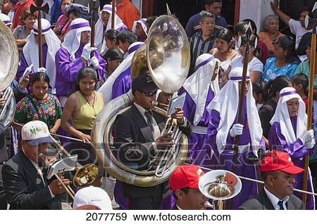 Stock Photo - A Music Band Plays Funeral Marches During The Procession Of The Holy Cross On Good Friday In Antigua Guatemala, Sacatep. Fotosearch