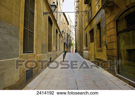 A narrow alley between buildings; Barcelona, Spain View Large Photo Image Stock Image - A narrow alley between buildings; Barcelona, Spain. Fotosearch