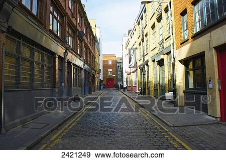 A narrow street of setts, Shoreditch; London, England View Large Photo Image Stock Photo - A narrow street of setts, Shoreditch; London, England. Fotosearch