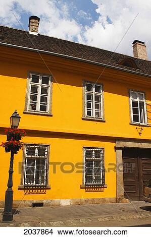 A Painted Yellow Building In The Castle District; Budapest Hungary View Large Photo Image Picture - A Painted Yellow Building In The Castle District; Budapest Hungary. Fotosearch