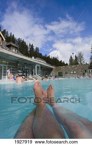 A Pair Of Legs Stretched Out In A Pool At Banff Upper Hot Springs, Banff National Park Of Canada View Large Photo Image Stock Photo - A Pair Of Legs Stretched Out In A Pool At Banff Upper Hot Springs, Banff National Park Of Canada. Fotosearch