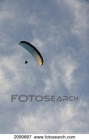 Stock Photo - A Paraglider Making The Final Descent Over Oludeniz At The Turquoise Coast, Southern Turkey. Fotosearch