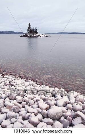 Stock Photograph - A Pebble Beach On Lake Superior; Rossport, Ontario, Canada. Fotosearch
