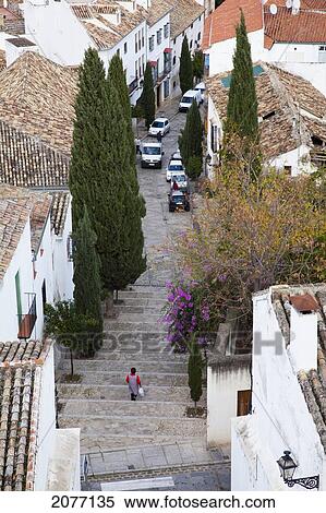 A Pedestrian Walks Down The Steps Towards A Street; Antequera Andalusia Spain View Large Photo Image Stock Photography - A Pedestrian Walks Down The Steps Towards A Street; Antequera Andalusia Spain. Fotosearch