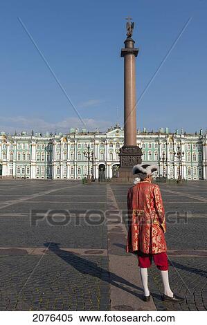 A Person Dressed In Traditional Costume In Palace Square Alexander Column And Winter Palace; St. Petersburg Russia View Large Photo Image Stock Photography - A Person Dressed In Traditional Costume In Palace Square Alexander Column And Winter Palace; St. Petersburg Russia. Fotosearch