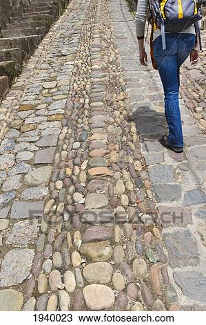 A Person Walks A Stone Path; Cusco Peru View Large Photo Image Stock Image - A Person Walks A Stone Path; Cusco Peru. Fotosearch