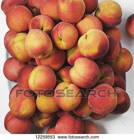 A pile of fresh peaches View Large Photo Image Stock Image - A pile of fresh peaches. Fotosearch