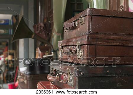 A Pile Of Old Luggage At The Panjiayuan Antique Market; Beijing, China View Large Photo Image Stock Image - A Pile Of Old Luggage At The Panjiayuan Antique Market; Beijing, China. Fotosearch