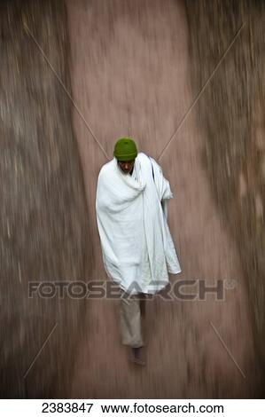A pilgrim at the Orthodox Easter celebration; Lalibela, Ethiopia View Large Photo Image Stock Photo - A pilgrim at the Orthodox Easter celebration; Lalibela, Ethiopia. Fotosearch