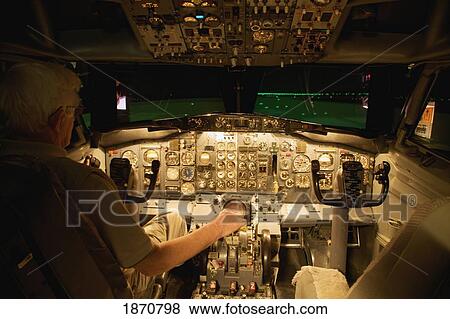 A Pilot In The Cockpit Of An Airplane View Large Photo Image Stock Photo - A Pilot In The Cockpit Of An Airplane. Fotosearch