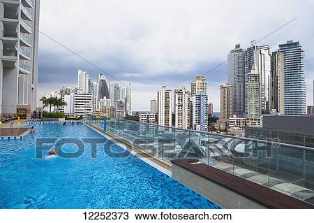 A poolside view overlooking the newer side of the Panama City skyline; Panama City, Panama View Large Photo Image Stock Image - A poolside view overlooking the newer side of the Panama City skyline; Panama City, Panama. Fotosearch