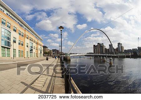 A Promenade And Bridge Crossing The River Tyne; Newcastle Northumberland England View Large Photo Image Stock Photography - A Promenade And Bridge Crossing The River Tyne; Newcastle Northumberland England. Fotosearch