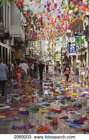 A Promenade Between The Shops Decorated By A Canopy Of Colourful Paper Balloons Fallen In The Rain; Ronda Malaga Spain View Large Photo Image Stock Image - A Promenade Between The Shops Decorated By A Canopy Of Colourful Paper Balloons Fallen In The Rain; Ronda Malaga Spain. Fotosearch