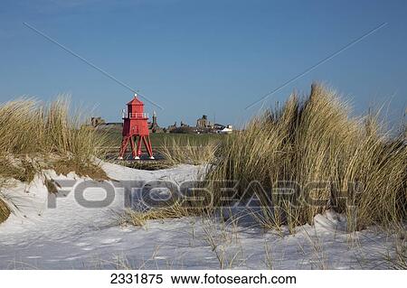 Stock Photography - A Red Beacon On The Shore Of The River Tyne; South Shields, Tyne And Wear, England. Fotosearch