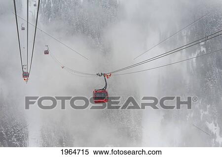 A Red Cable Car Above The Snowy Forest; Whistler British Columbia Canada View Large Photo Image Stock Photography - A Red Cable Car Above The Snowy Forest; Whistler British Columbia Canada. Fotosearch