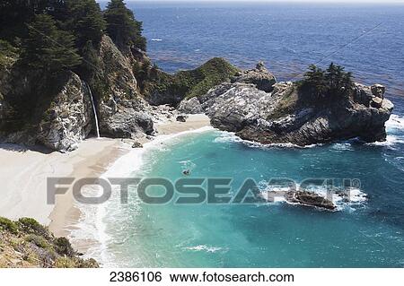 Stock Photograph - A remote beach along the rugged coastline; California, United States of America. Fotosearch