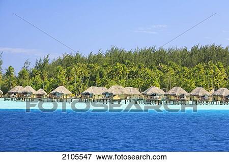 Stock Photo - A Resort Along The Coast Of Motu Paahi Near Bora Bora Airport; Society Islands French Polynesia South Pacific. Fotosearch