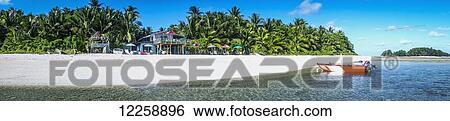 Stock Photograph - A resort island which is a short boat ride from the Tuvalu mainland; Tuvalu. Fotosearch