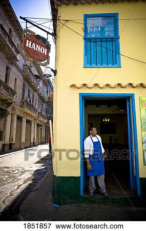 A Restaurant In Cuba With A Cook Standing In The Doorway View Large Photo Image Stock Photo - A Restaurant In Cuba With A Cook Standing In The Doorway. Fotosearch