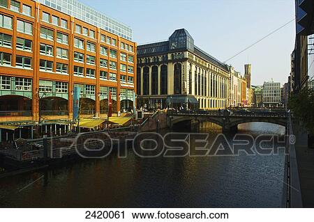 A road bridge crossing the river and buildings along the river; Hamburg, Germany View Large Photo Image Stock Image - A road bridge crossing the river and buildings along the river; Hamburg, Germany. Fotosearch