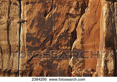 A rock climber on Generic Crack 5. 10; Indian Creek, Utah, United States of America View Large Photo Image Stock Photography - A rock climber on Generic Crack 5. 10; Indian Creek, Utah, United States of America. Fotosearch