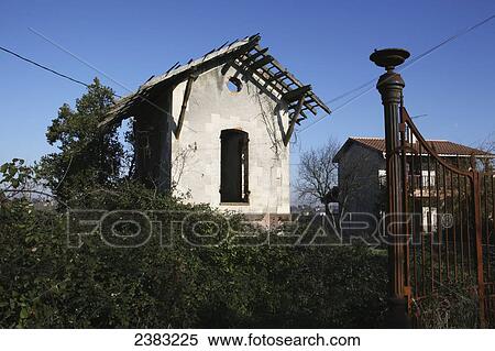 A run-down building on the outskirts of town; Moissac, Tarn et Garonne region, Midi-Pyrenees, France View Large Photo Image Stock Photography - A run-down building on the outskirts of town; Moissac, Tarn et Garonne region, Midi-Pyrenees, France. Fotosearch