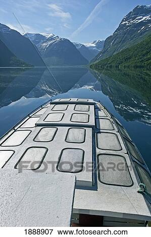 A Scenic Boat Trip Across The Waters Of Lovatn Lake View Large Photo Image Stock Photo - A Scenic Boat Trip Across The Waters Of Lovatn Lake. Fotosearch