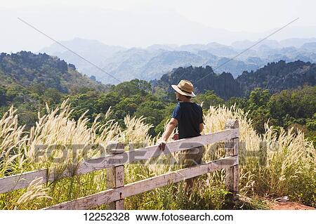 Stock Photo - A scenic roadside stop outside of Tad Leuk; Laos. Fotosearch