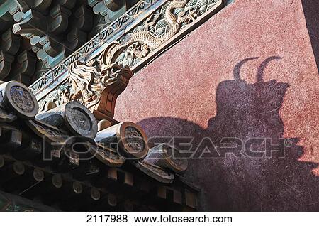 A Sculpture And It's Shadow On An Ornate Roofline; Beijing China View Large Photo Image Stock Photo - A Sculpture And It's Shadow On An Ornate Roofline; Beijing China. Fotosearch