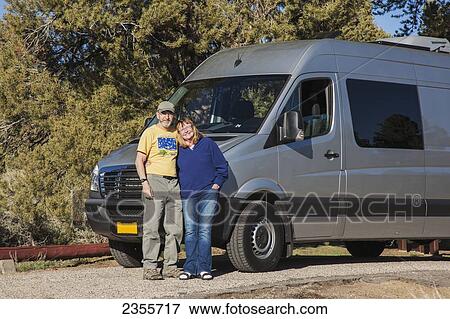 Stock Photo - A Senior Couple Stand In Front Of Their Camper Van At The Bob Scott Forest Service Campground Near Ely; Nevada, United States Of America. Fotosearch