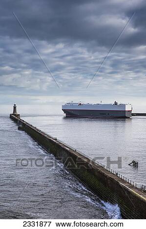 A Ship And Breakwater On The River Tyne; North Shields, Tyne And Wear, England View Large Photo Image Stock Photo - A Ship And Breakwater On The River Tyne; North Shields, Tyne And Wear, England. Fotosearch
